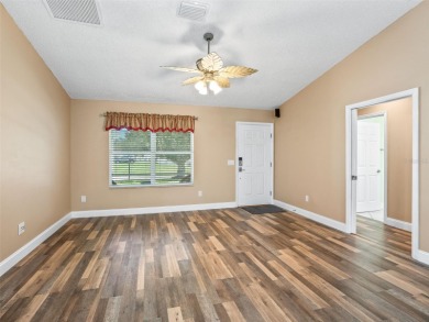 One or more photo(s) has been virtually staged. Charming 3/2 on The Links of Spruce Creek in Florida - for sale on GolfHomes.com, golf home, golf lot