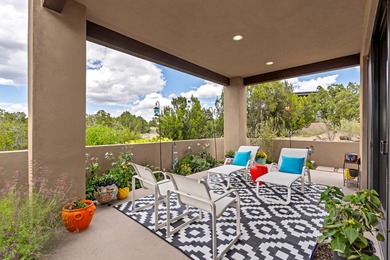 Discover the perfect blend of modern luxury and Southwest charm on The Club At Las Campanas  in New Mexico - for sale on GolfHomes.com, golf home, golf lot