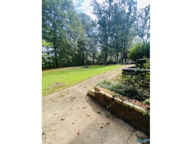 Prime location located across the road from Cherokee Pines Golf on Cherokee Country Club in Alabama - for sale on GolfHomes.com, golf home, golf lot