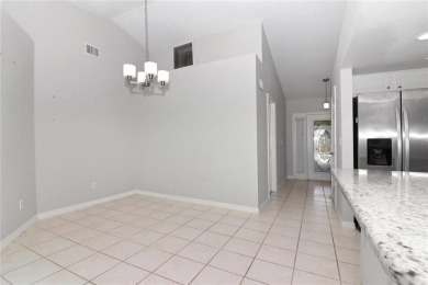 Spacious and well-designed, this Princess model sits proudly on on Monarch At Royal Highlands in Florida - for sale on GolfHomes.com, golf home, golf lot