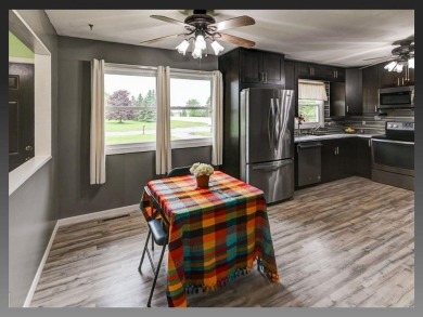 SET FOR LIVING with over 1.5 Acres located in desirable location on The Oaks Golf Course in Wisconsin - for sale on GolfHomes.com, golf home, golf lot
