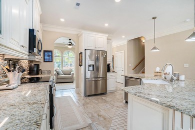 Welcome to this exquisite waterfront residence along the Intra on Arrowhead Country Club in South Carolina - for sale on GolfHomes.com, golf home, golf lot