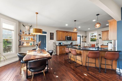 Welcome to this beautiful custom-built 3-bedroom, 2.5-bath home on Lakes of the Four Seasons Country Club in Indiana - for sale on GolfHomes.com, golf home, golf lot