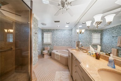THE INTANGIBLE VALUE OF THIS 3 BEDROOM 2 FULL BATH, 2 HALF BATH on Mangrove Bay Golf Course in Florida - for sale on GolfHomes.com, golf home, golf lot