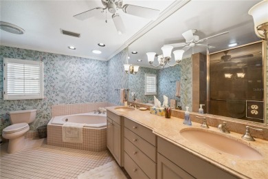 THE INTANGIBLE VALUE OF THIS 3 BEDROOM 2 FULL BATH, 2 HALF BATH on Mangrove Bay Golf Course in Florida - for sale on GolfHomes.com, golf home, golf lot
