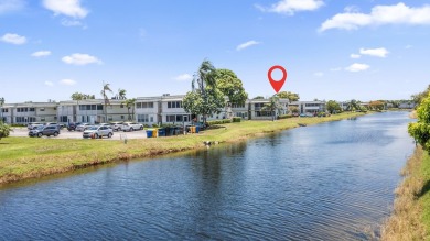 Waterfront Elegance | 2BR/2BA in King's Point Golf & Country on Kings Point Golf -Flanders Way in Florida - for sale on GolfHomes.com, golf home, golf lot