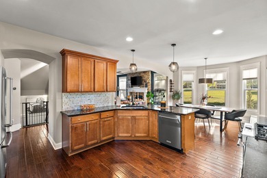 Welcome to this beautiful custom-built 3-bedroom, 2.5-bath home on Lakes of the Four Seasons Country Club in Indiana - for sale on GolfHomes.com, golf home, golf lot