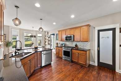 Welcome to this beautiful custom-built 3-bedroom, 2.5-bath home on Lakes of the Four Seasons Country Club in Indiana - for sale on GolfHomes.com, golf home, golf lot