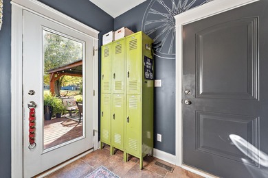 Welcome to this beautiful custom-built 3-bedroom, 2.5-bath home on Lakes of the Four Seasons Country Club in Indiana - for sale on GolfHomes.com, golf home, golf lot