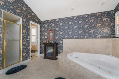 Stunning 3 Bedroom, 3.5 Bathroom plus Loft Bonus Room and 3 Car on Twin Isles Country Club in Florida - for sale on GolfHomes.com, golf home, golf lot