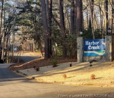 This gorgeous home is ready for its new owner. Nestled in the on Carolina Trace Country Club in North Carolina - for sale on GolfHomes.com, golf home, golf lot