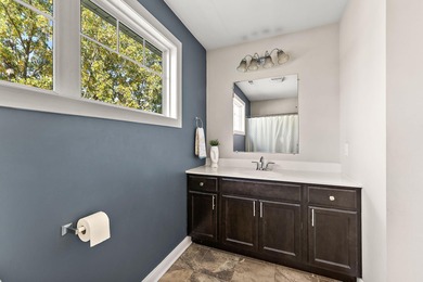 Welcome to this beautiful custom-built 3-bedroom, 2.5-bath home on Lakes of the Four Seasons Country Club in Indiana - for sale on GolfHomes.com, golf home, golf lot