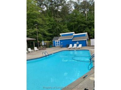 This gorgeous home is ready for its new owner. Nestled in the on Carolina Trace Country Club in North Carolina - for sale on GolfHomes.com, golf home, golf lot
