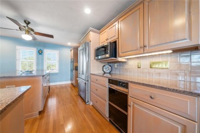 THE INTANGIBLE VALUE OF THIS 3 BEDROOM 2 FULL BATH, 2 HALF BATH on Mangrove Bay Golf Course in Florida - for sale on GolfHomes.com, golf home, golf lot