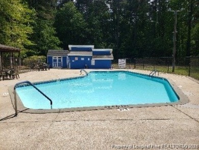 This gorgeous home is ready for its new owner. Nestled in the on Carolina Trace Country Club in North Carolina - for sale on GolfHomes.com, golf home, golf lot