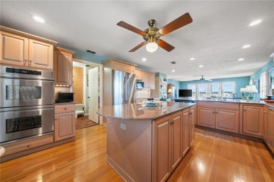 THE INTANGIBLE VALUE OF THIS 3 BEDROOM 2 FULL BATH, 2 HALF BATH on Mangrove Bay Golf Course in Florida - for sale on GolfHomes.com, golf home, golf lot