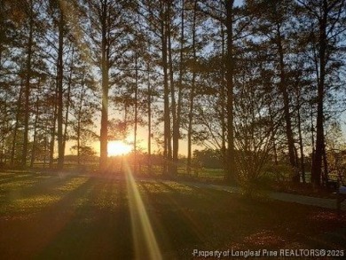 This gorgeous home is ready for its new owner. Nestled in the on Carolina Trace Country Club in North Carolina - for sale on GolfHomes.com, golf home, golf lot