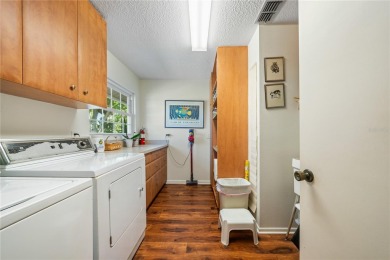 THE INTANGIBLE VALUE OF THIS 3 BEDROOM 2 FULL BATH, 2 HALF BATH on Mangrove Bay Golf Course in Florida - for sale on GolfHomes.com, golf home, golf lot