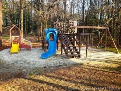 This gorgeous home is ready for its new owner. Nestled in the on Carolina Trace Country Club in North Carolina - for sale on GolfHomes.com, golf home, golf lot