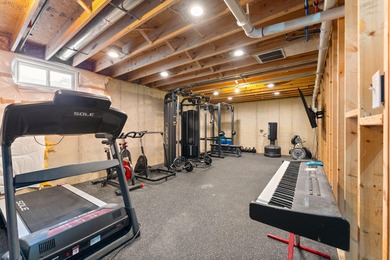 Welcome to this beautiful custom-built 3-bedroom, 2.5-bath home on Lakes of the Four Seasons Country Club in Indiana - for sale on GolfHomes.com, golf home, golf lot