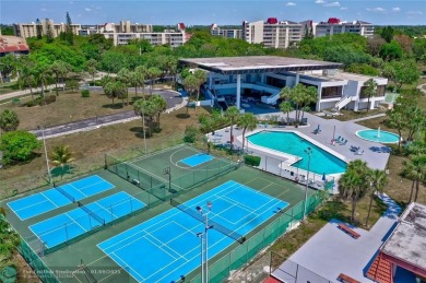 GORGEOUS PRISTINE 1530 SQUARE FEET FULLY RENOVATED condo in on Inverrary Country Club in Florida - for sale on GolfHomes.com, golf home, golf lot