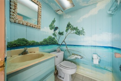 THE INTANGIBLE VALUE OF THIS 3 BEDROOM 2 FULL BATH, 2 HALF BATH on Mangrove Bay Golf Course in Florida - for sale on GolfHomes.com, golf home, golf lot