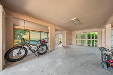 THE INTANGIBLE VALUE OF THIS 3 BEDROOM 2 FULL BATH, 2 HALF BATH on Mangrove Bay Golf Course in Florida - for sale on GolfHomes.com, golf home, golf lot