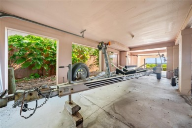 THE INTANGIBLE VALUE OF THIS 3 BEDROOM 2 FULL BATH, 2 HALF BATH on Mangrove Bay Golf Course in Florida - for sale on GolfHomes.com, golf home, golf lot