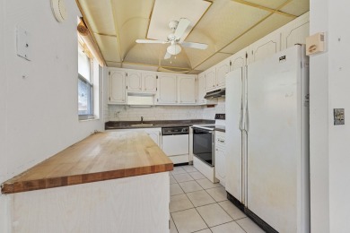 Value-Priced 2BR/2BA in King's Point Golf & Country Club - 55+ on Addison Reserve in Florida - for sale on GolfHomes.com, golf home, golf lot