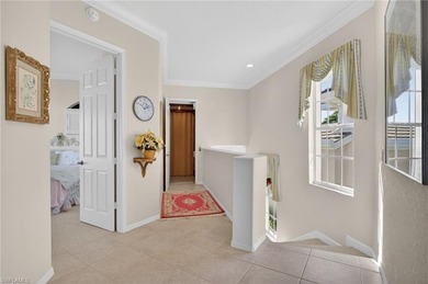 ELEVATE YOURSELF into this lovely second-floor coach home in on Pelican Marsh Golf Club in Florida - for sale on GolfHomes.com, golf home, golf lot