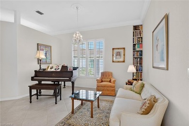 ELEVATE YOURSELF into this lovely second-floor coach home in on Pelican Marsh Golf Club in Florida - for sale on GolfHomes.com, golf home, golf lot