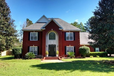 This lovely two-story brick home is located in The Highlands on on Highland Oaks Golf Course in Alabama - for sale on GolfHomes.com, golf home, golf lot