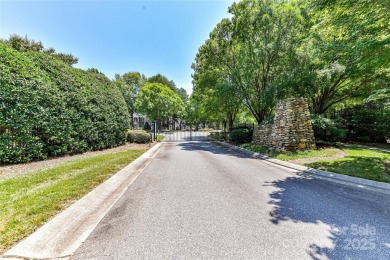 Beautiful, Waterview, level, wooded lot located in the gated on Trump National Golf Club Charlotte in North Carolina - for sale on GolfHomes.com, golf home, golf lot