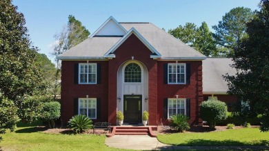 This lovely two-story brick home is located in The Highlands on on Highland Oaks Golf Course in Alabama - for sale on GolfHomes.com, golf home, golf lot