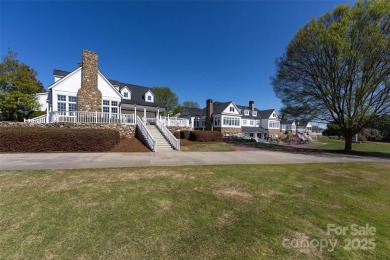 Beautiful, Waterview, level, wooded lot located in the gated on Trump National Golf Club Charlotte in North Carolina - for sale on GolfHomes.com, golf home, golf lot