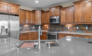 Popular Gala model on a premium oversized golf course lot on Copper Canyon Golf Club in Arizona - for sale on GolfHomes.com, golf home, golf lot