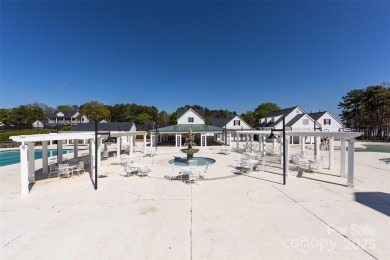 Beautiful, Waterview, level, wooded lot located in the gated on Trump National Golf Club Charlotte in North Carolina - for sale on GolfHomes.com, golf home, golf lot