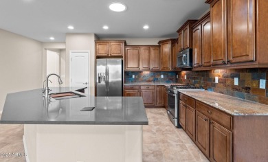 Popular Gala model on a premium oversized golf course lot on Copper Canyon Golf Club in Arizona - for sale on GolfHomes.com, golf home, golf lot