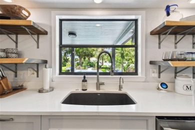 Outdoor Paradise in Palm Harbor - Elevated, Elegant, and on Innisbrook Resort and Golf Club in Florida - for sale on GolfHomes.com, golf home, golf lot