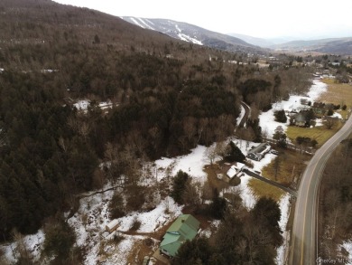 Sold as is.

3 minutes to the ski slopes and across the street on Windham Country Club in New York - for sale on GolfHomes.com, golf home, golf lot
