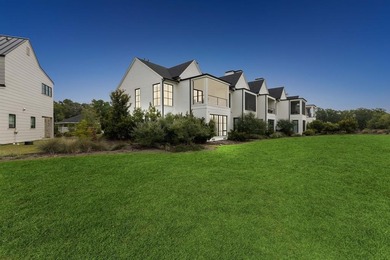 Overlooking the harbor, amphitheater and iconic Hennybay Bridge on Long Cove Golf Course in Texas - for sale on GolfHomes.com, golf home, golf lot