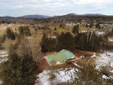 Sold as is.

3 minutes to the ski slopes and across the street on Windham Country Club in New York - for sale on GolfHomes.com, golf home, golf lot