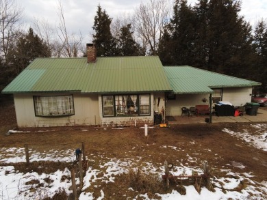 Sold as is.

3 minutes to the ski slopes and across the street on Windham Country Club in New York - for sale on GolfHomes.com, golf home, golf lot
