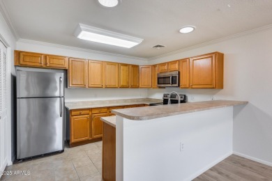 Welcome to this beautiful 2-bedroom, 2-bathroom condo in the on Sun Village Golf Course in Arizona - for sale on GolfHomes.com, golf home, golf lot