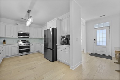 Welcome to 132 Fresh Meadow Lane - An Exceptional End-Unit on Dunes West Golf Club in South Carolina - for sale on GolfHomes.com, golf home, golf lot