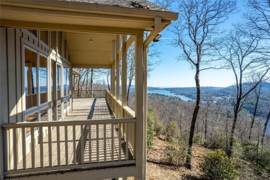 Discover your mountain retreat offering sweeping views of Lake on Lake Toxaway Country Club in North Carolina - for sale on GolfHomes.com, golf home, golf lot
