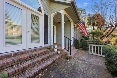 Courtyard entrance and elegance to this Pawleys Plantation on Pawleys Plantation Golf and Country Club in South Carolina - for sale on GolfHomes.com, golf home, golf lot