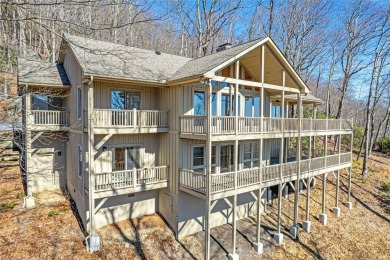 Discover your mountain retreat offering sweeping views of Lake on Lake Toxaway Country Club in North Carolina - for sale on GolfHomes.com, golf home, golf lot