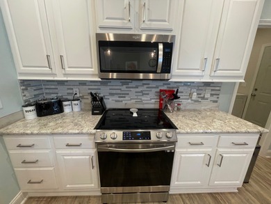 This 3 Bedroom 2 Bath home has been meticulously kept and is on Water Oak Country Club Estates in Florida - for sale on GolfHomes.com, golf home, golf lot