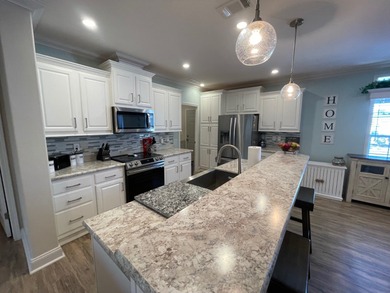 This 3 Bedroom 2 Bath home has been meticulously kept and is on Water Oak Country Club Estates in Florida - for sale on GolfHomes.com, golf home, golf lot